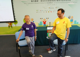 Mr Wong (Left), Service Recipient of GrandMove® demonstrated exercise moves under the supervision of Mr Ng (Right), Exercise Coach.