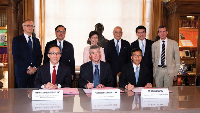 (Front, from left) Professor Gabriel Leung, HKU’s Dean of Medicine, Professor Stewart Cole, President of Institut Pasteur and Mr Albert Wong, Chief Executive Officer of HKSTP, represented The University of Hong Kong, Institut Pasteur and Hong Kong Science and Technology Parks Corporation respectively, signed a Memorandum of Understanding in Paris today (June 21, 2018) to set up a joint biomedical research centre, witnessed by a high-level delegation led by The Hon Mrs Carrie Lam, the Chief Executive of the Hong Kong Special Administrative Region. (Back, from left) Dr Marc Jouan, International Vice President of the Institut Pasteur; Mr Nicholas W Yang, Secretary for Innovation and Technology; The Hon Mrs Carrie Lam, the Chief Executive; Mr Leo Kung Lin-cheng, Chairman of Board of Directors of Ocean Park; Mr Edward Yau Tang-wah, Secretary for Commerce and Economic Development and Professor Roberto Bruzzone, Co-Director of HKU Pasteur Research Pole.
