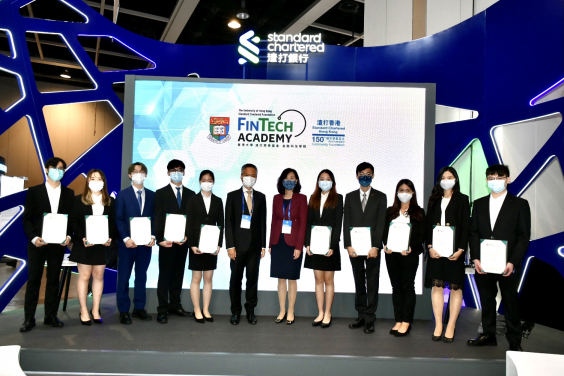 Prof Tak-Wah Lam, Executive Director of the HKU-SCF FinTech Academy, Ms Mary Huen, Co-chair of the HKU-SCF FinTech Academy and Standard Chartered’s Chief Executive Officer for Hong Kong, and the 2021-22 scholarship receipients.