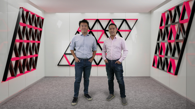 Figure 1. Research Assistant Professor Zheng YAN (on the right) and Associate Professor Zi Yang MENG from HKU Department of Physics standing in the imaginary space decorated with the novel quantum states they discovered. The HKU Physics team and their collaborators designed a soft-constrained model to describe the programmable quantum simulator and predict the novel entangled states on it. The research work has been published in Nature Communications recently.

 