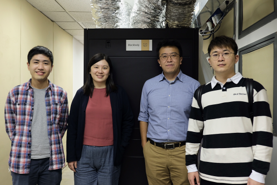 Project leaders in research teams from HKU Physics stood next to Blackbody in the mini data center. They led the teams to deploy the new supercomputing system. From the left: Mr Tom Man KWAN; Dr Jane Lixin DAI, Assistant Professor; Dr Zi Yang MENG, Associate Professor and Mr Hongyu LU
 