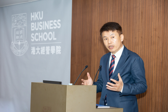 2. Professor Hongbin Cai, Dean and Chair of Economics of HKU Business School delivers a welcoming remarks.