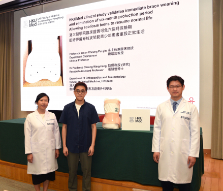 HKUMed has conducted the largest clinical trial on brace weaning to date, revealing that immediate brace removal is the preferred strategy for patients with adolescent idiopathic scoliosis (AIS) once skeletal development is mature. This finding provides effective evidence to cancel the current standard protection period. Pictured (from left) are Dr Prudence Cheung Wing-hang, a former AIS patient Mr Yiu, and Professor Jason Cheung Pui-yin.
 